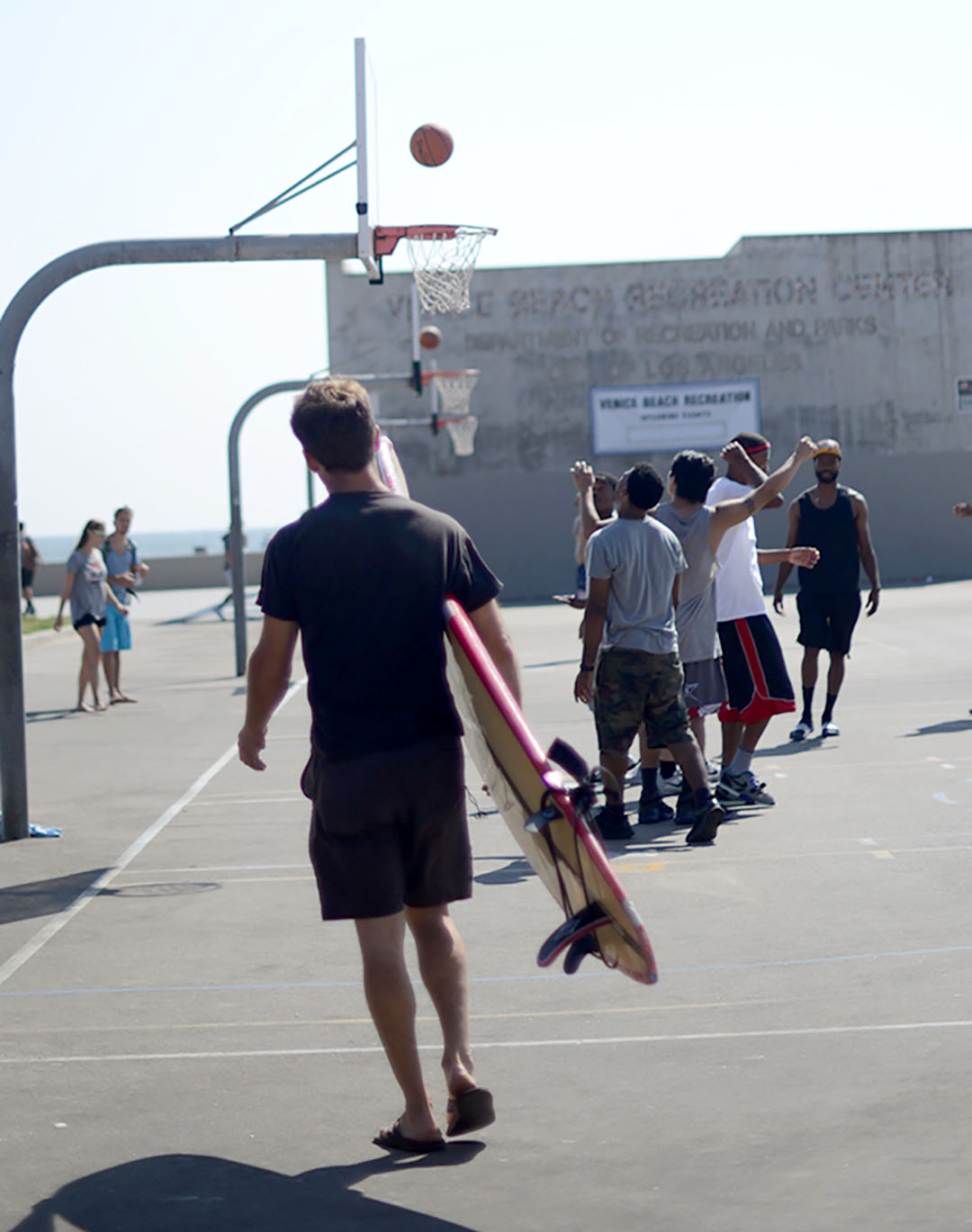 surf dude at venice beach photographed by sara delaney