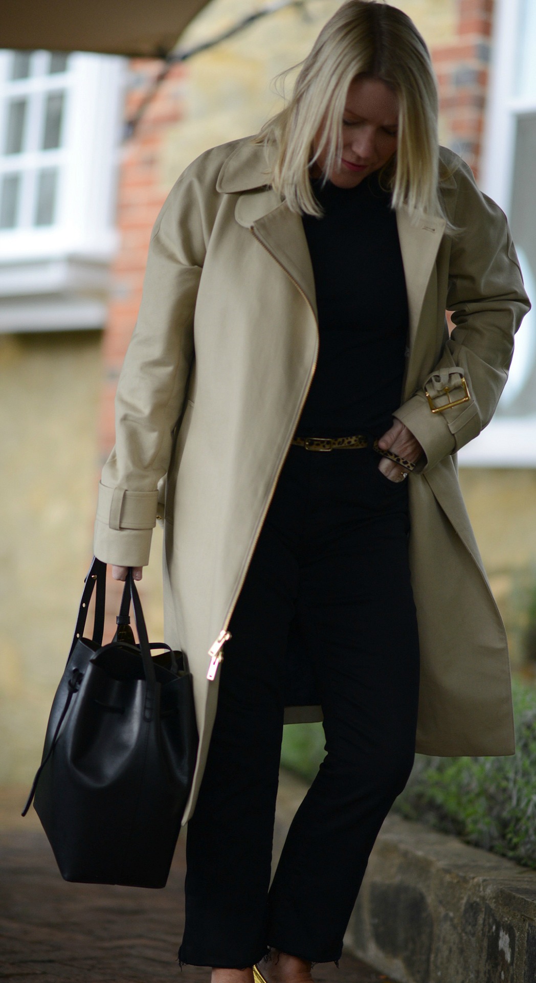 j.crew trench coat worn by stylist and fashion blogger sara delaney
